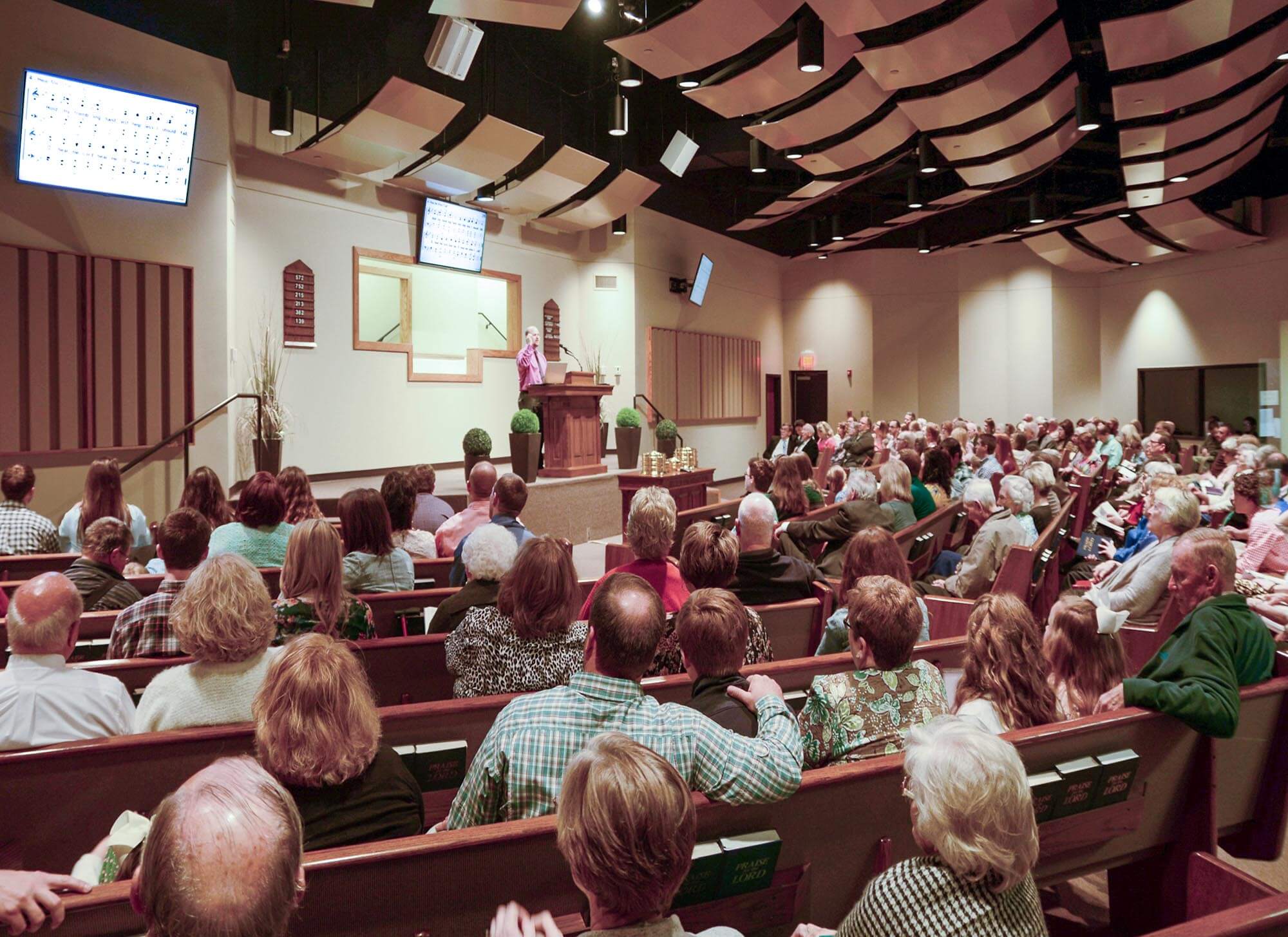 Congregation gathered inside Stoneridge Church of Christ auditorium during worship service
